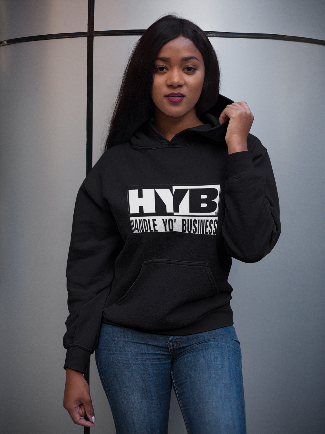 girl-holding-her-HYB-hoodie